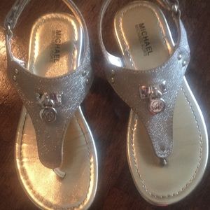 Brand new Michael Kors gold sandals